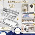 Dimostrazione del risparmio di spazio: il cesto grigio Homellence piegato si ripone perfettamente in piccoli spazi accanto alla lavatrice.