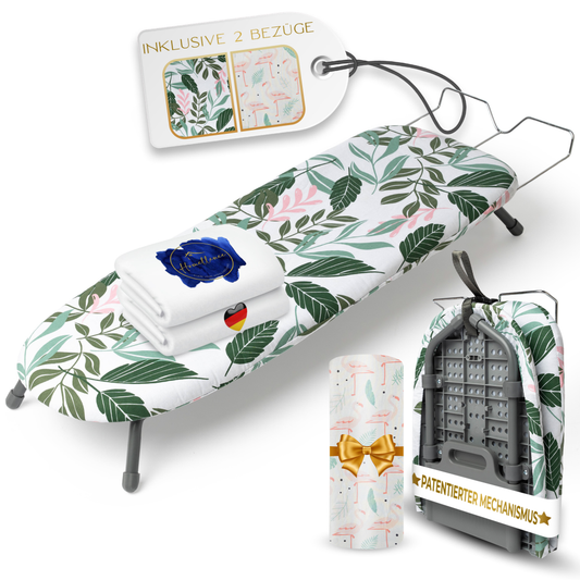 Homellence Tischbügelbrett-Set mit modernem Blätter- und Flamingo-Design, inklusive zwei Ersatzbezügen und patentiertem, stabilem Klappmechanismus.