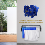 Estética y funcionalidad Homellence: escena decorativa con el tendedero de pared color antracita integrado en un hogar moderno.