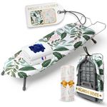 Mini planche à repasser de table Homellence avec motif feuilles vertes, incluant deux housses premium et un mécanisme breveté ultra-stable.
